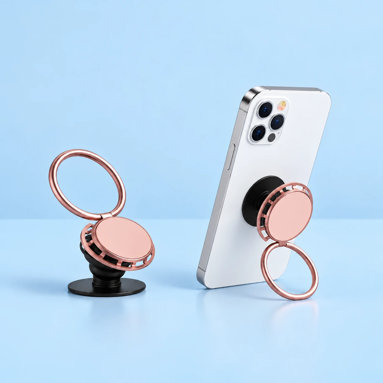 Dusty pink expandable phone grip with rose-gold hinged finger ring, complete product and source-based stationary portrait phone use; demonstration phone is not included., square composition