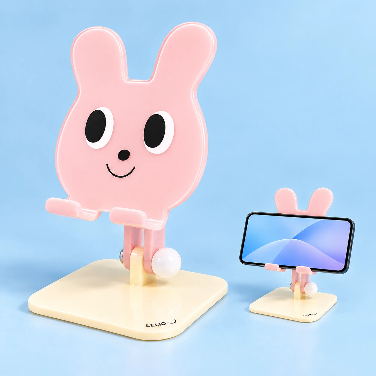 Pastel pink smiling rabbit acrylic phone stand and illustrative landscape-phone support