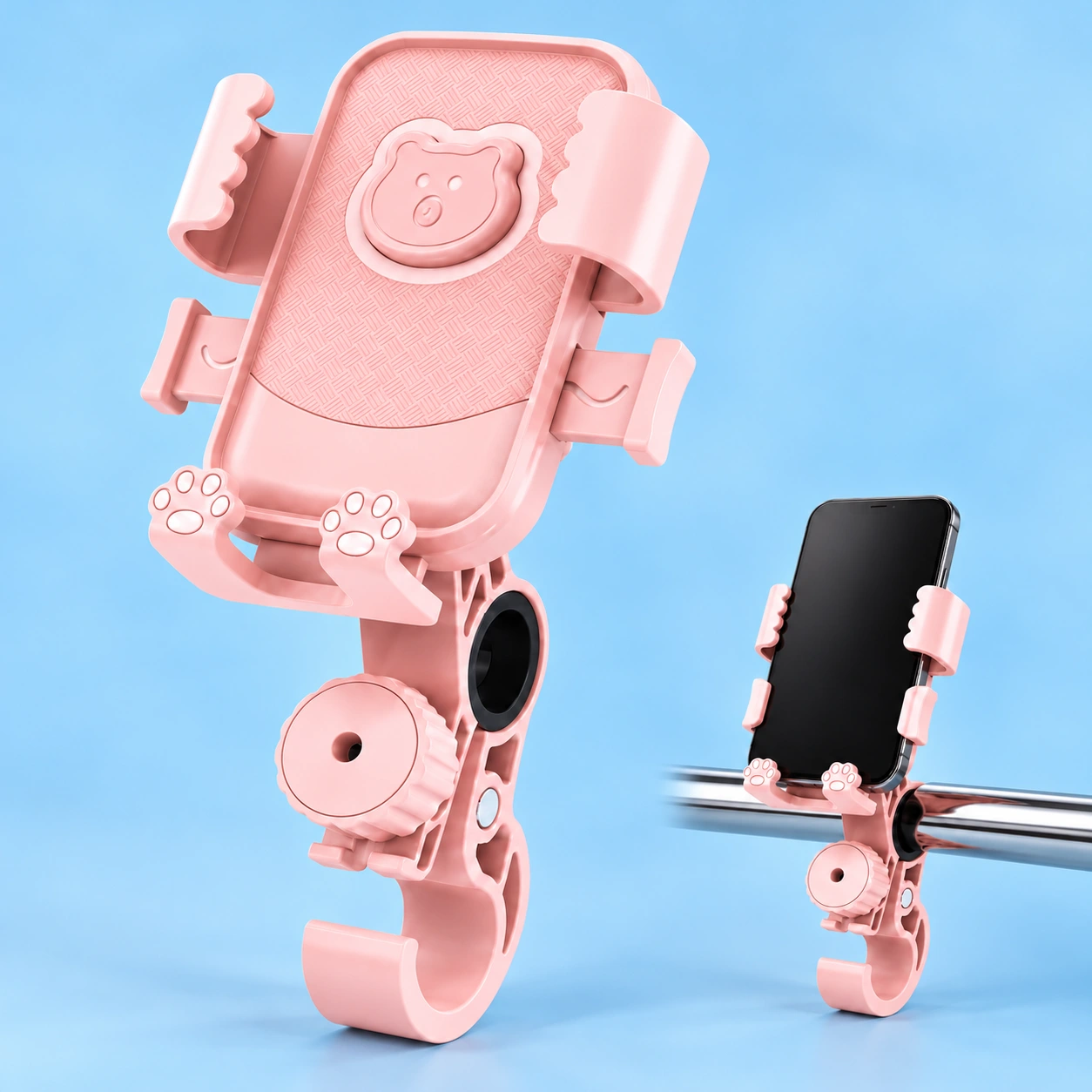 Pink bear handlebar phone holder with hook shown complete and mounted on a stationary handlebar
