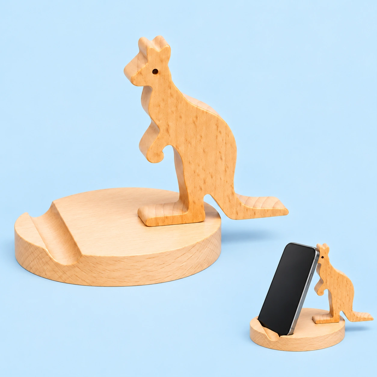 Wooden Kangaroo Phone Stand shown complete and supporting a portrait phone in its base groove
