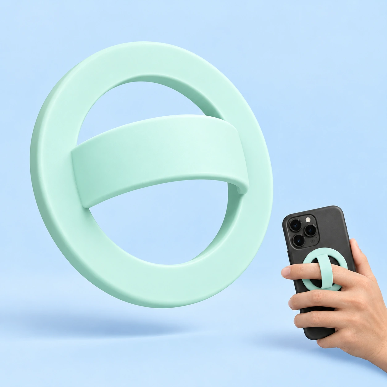 Mint silicone magnetic phone grip ring and illustrative finger-grip use