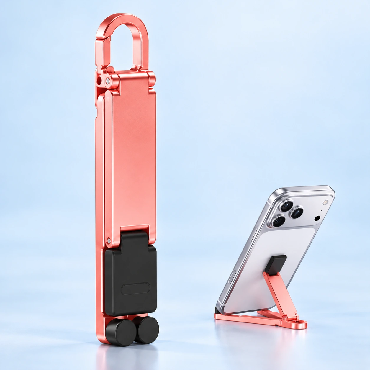 Pink plastic mini folding keychain phone stand and deployed phone support illustration