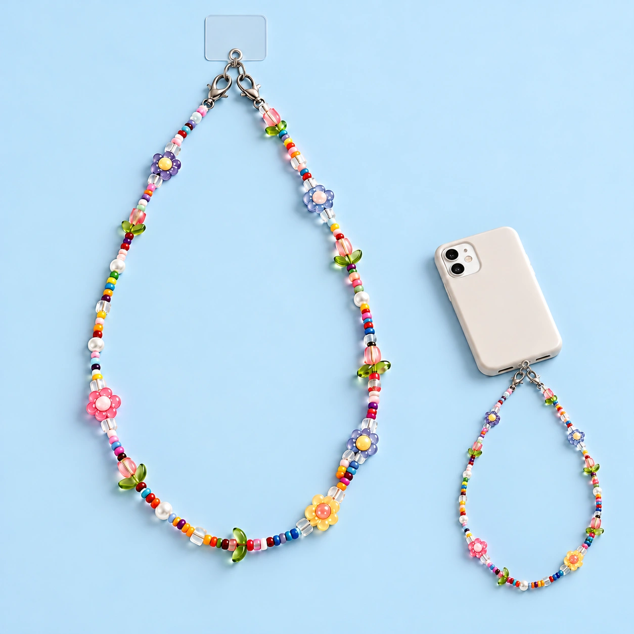 Pastel tulip beaded phone lanyard with clear anchor tab and illustrative case attachment