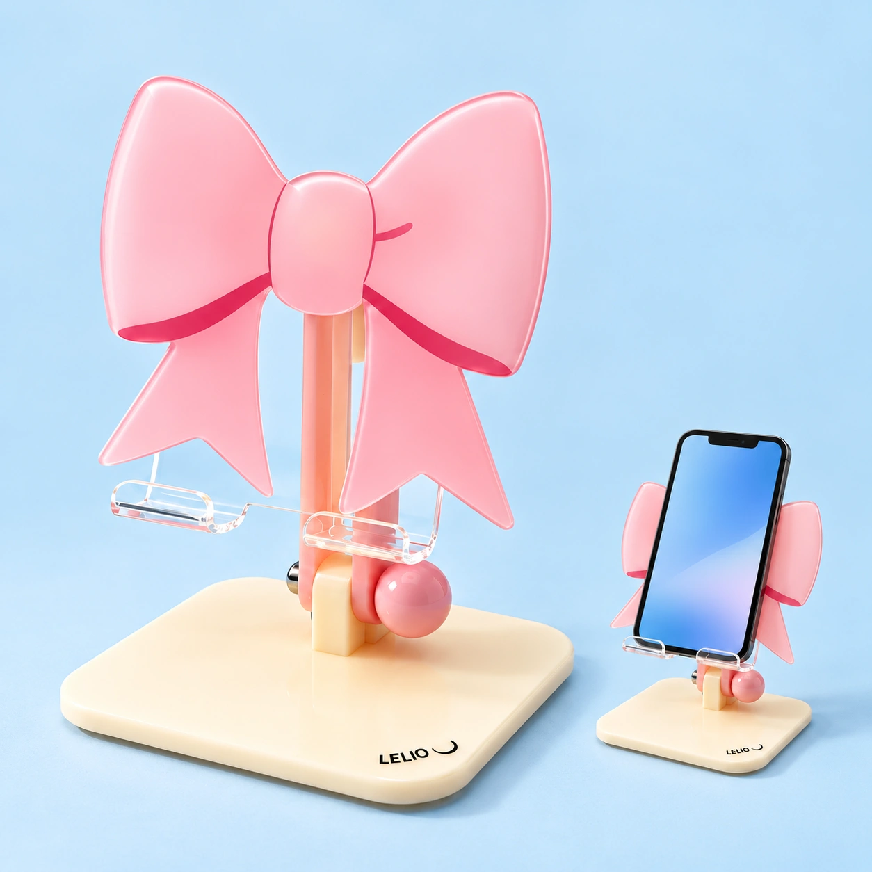 Pink bow acrylic desktop phone stand with clear hooks and illustrative portrait phone support