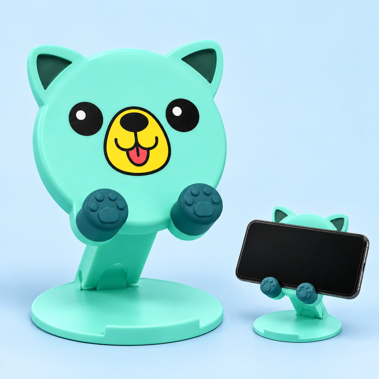 Mint pointed-ear puppy folding phone stand shown complete and supporting a landscape phone