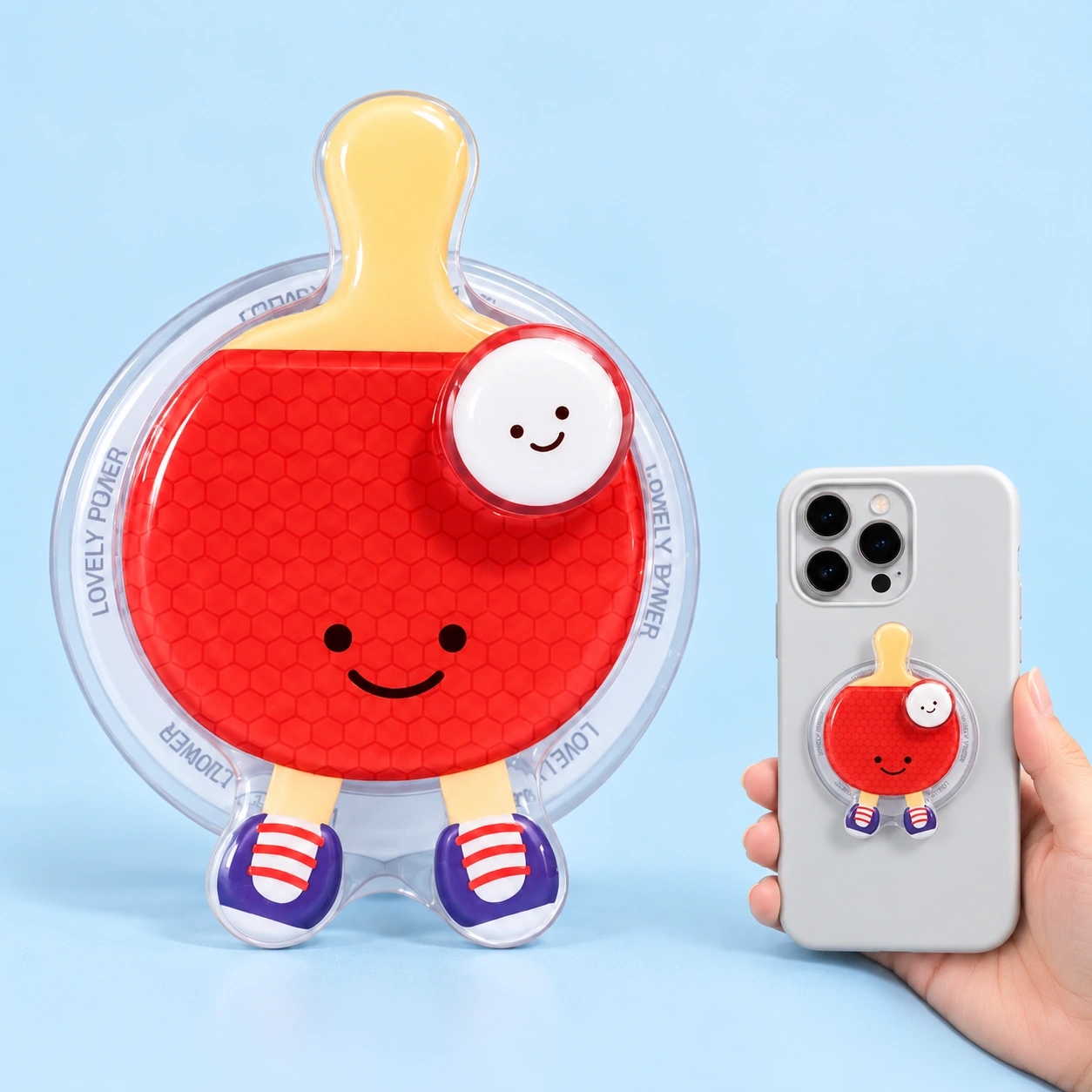 Smiling table-tennis paddle magnetic phone grip and flat phone-mounted illustration