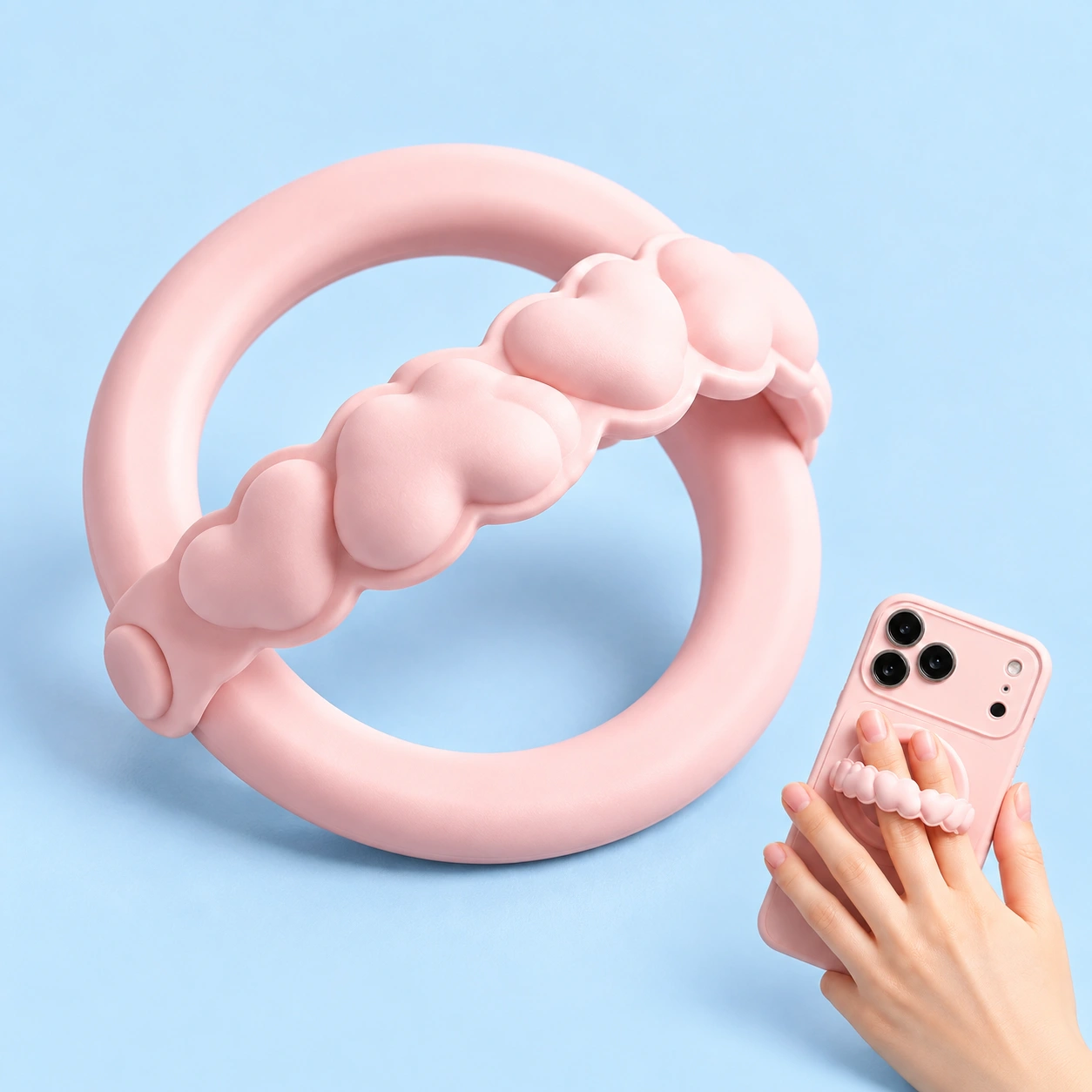 Pastel pink magnetic heart-band phone grip and two-finger hand-use illustration