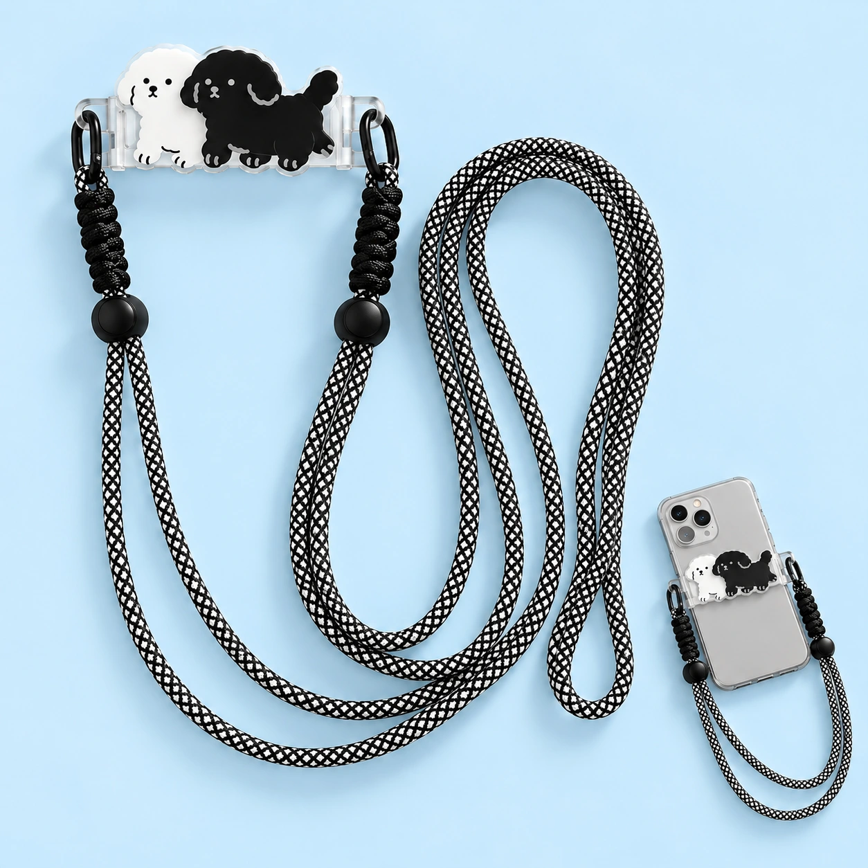 Black and white twin-dog clip-on phone lanyard complete set and phone-case attachment illustration