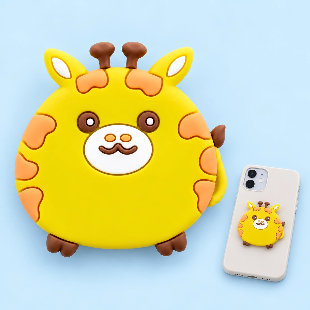 Round Yellow Giraffe Expandable Phone Grip shown complete and mounted flat on a phone case