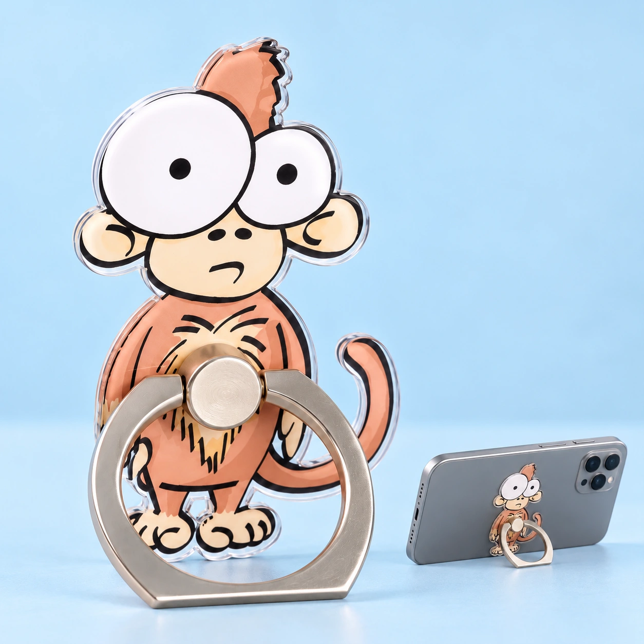 Monkey Phone Ring Holder shown complete with illustrated phone use