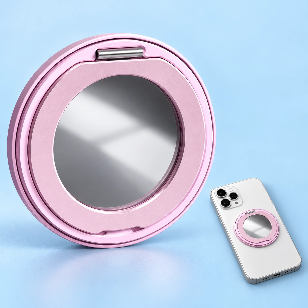 Pastel pink inset-ring mirror phone kickstand and flat phone-back mounting illustration