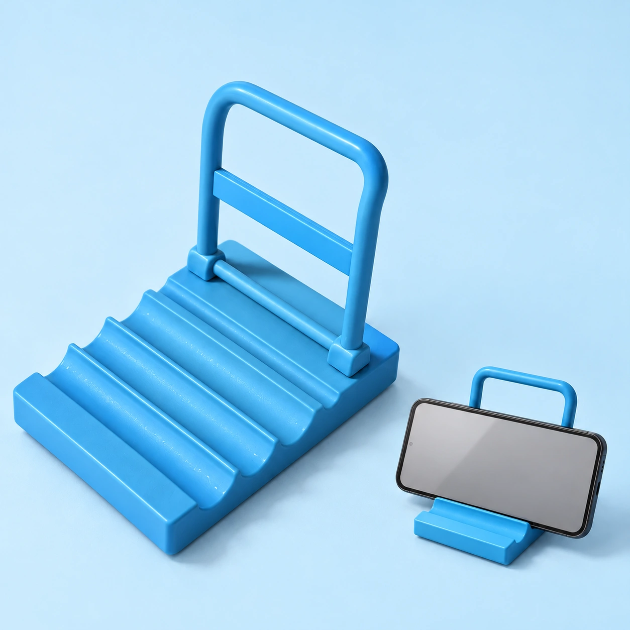 Blue mini cart adjustable phone stand, complete grooved base and upright frame left and landscape phone supported right; phone not included