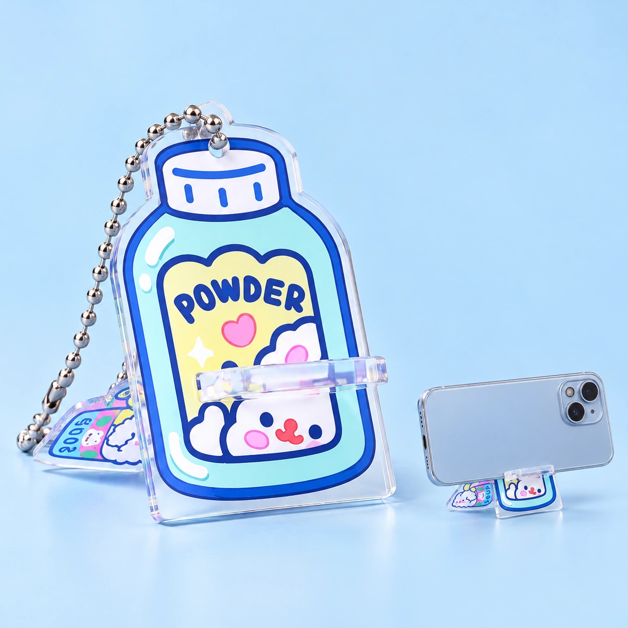 Pastel bunny bottle two-piece acrylic phone stand and landscape phone illustration
