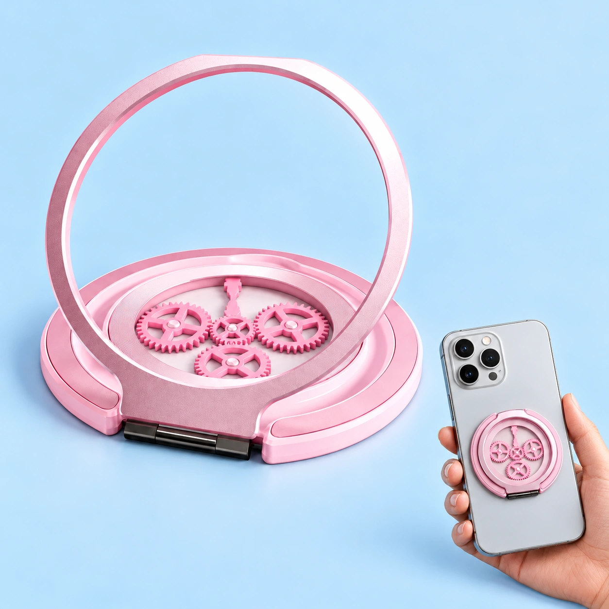 Pink gear-window magnetic phone ring holder, with illustrative flat phone attachment