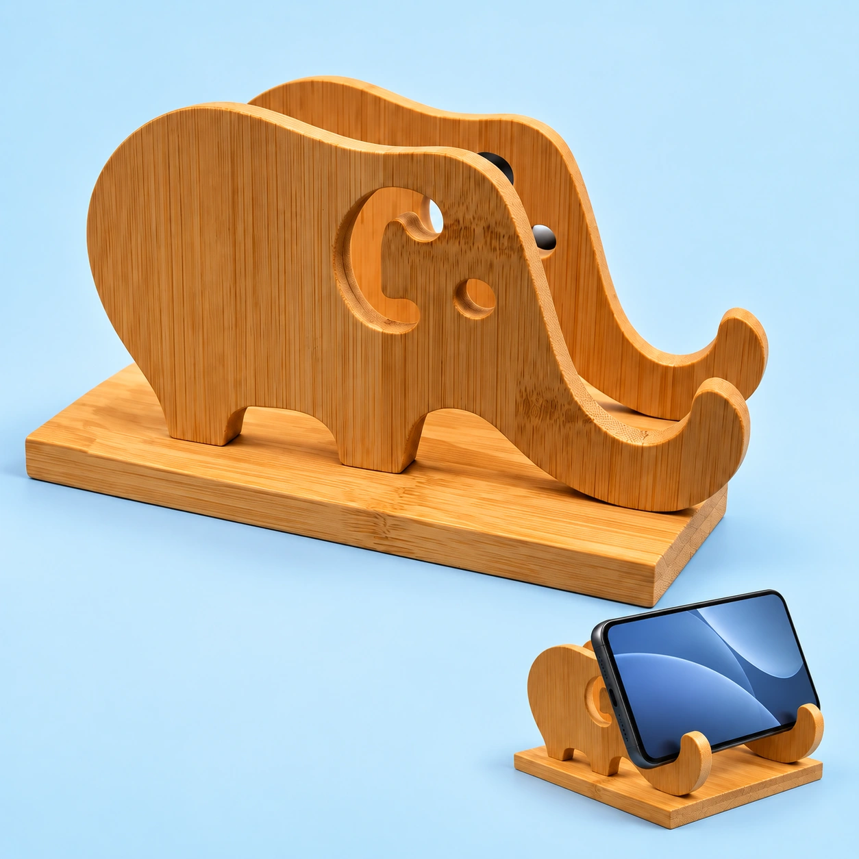 Twin-elephant bamboo phone stand with rectangular base and illustrative landscape phone support