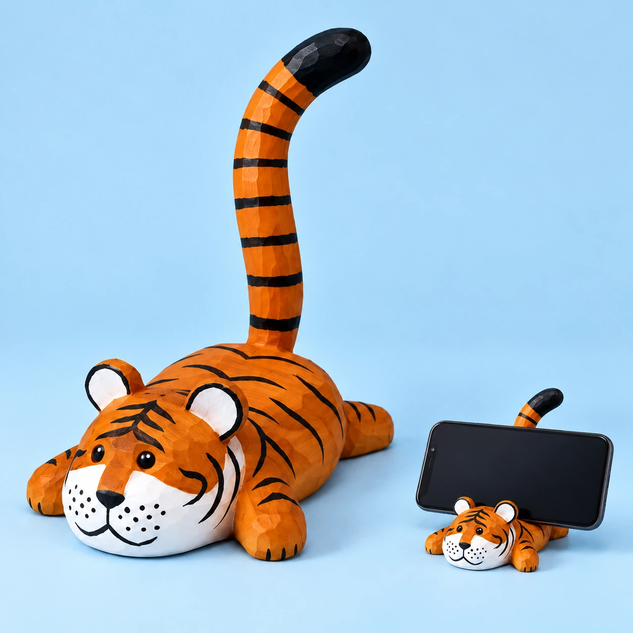 Carved tiger tail phone stand and illustrative landscape-phone support
