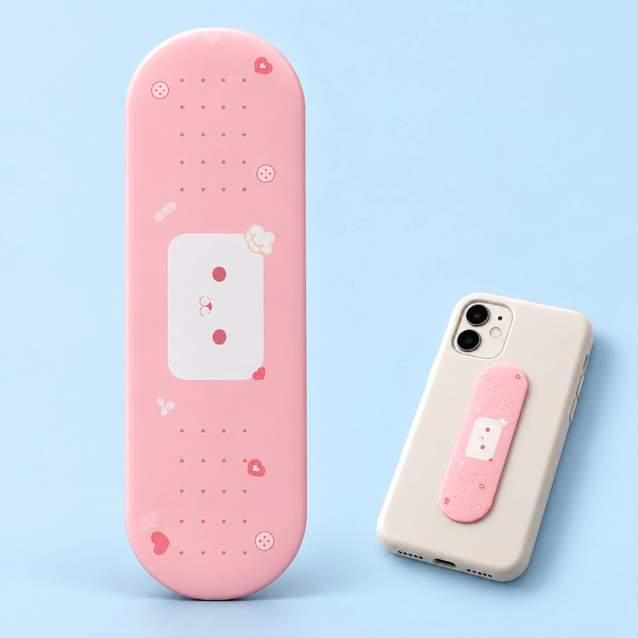 Pink bear bandage-style sliding phone stand shown flat and mounted on a phone case