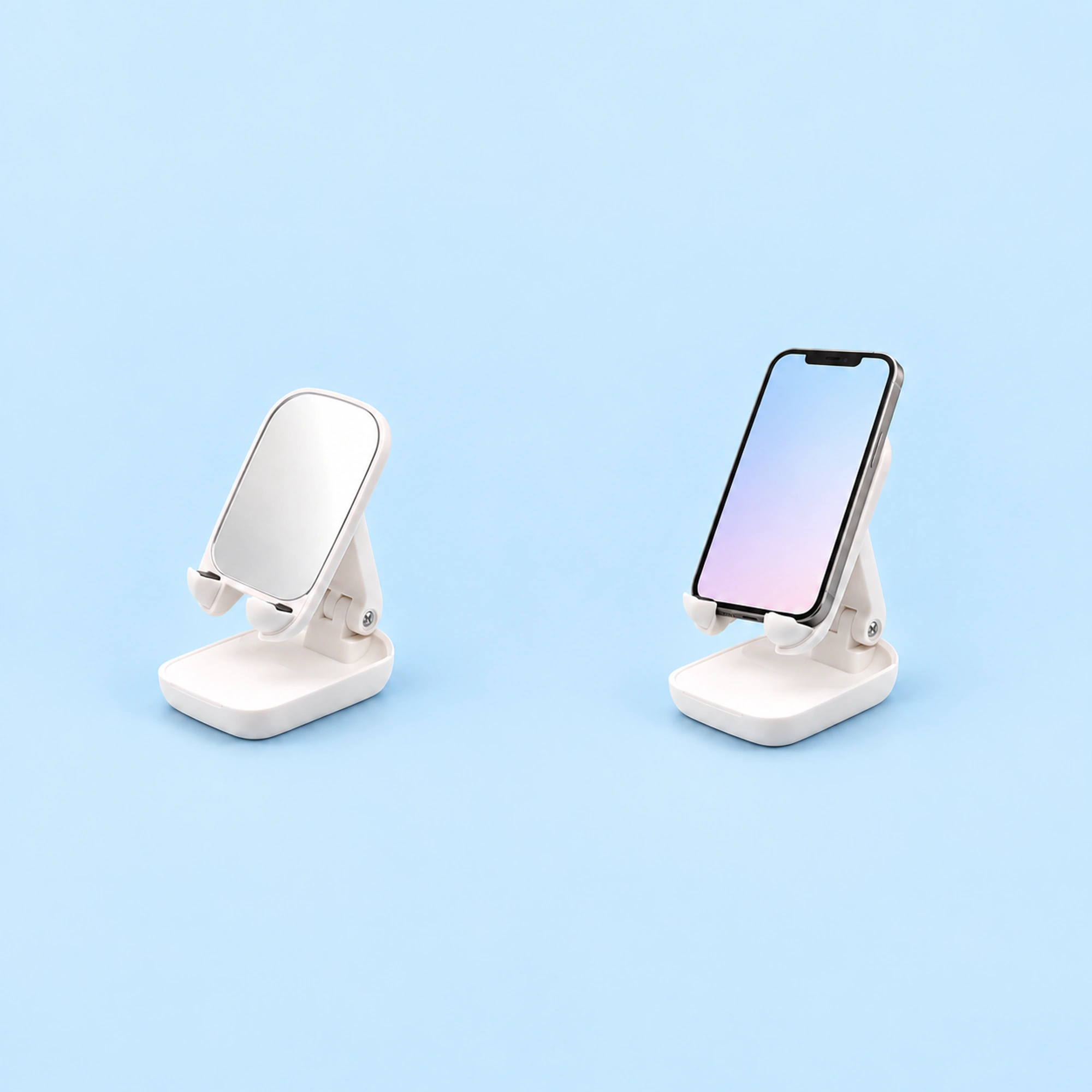 White Mirror-Back Folding Phone Stand shown in use on a light blue background; demonstration device not included