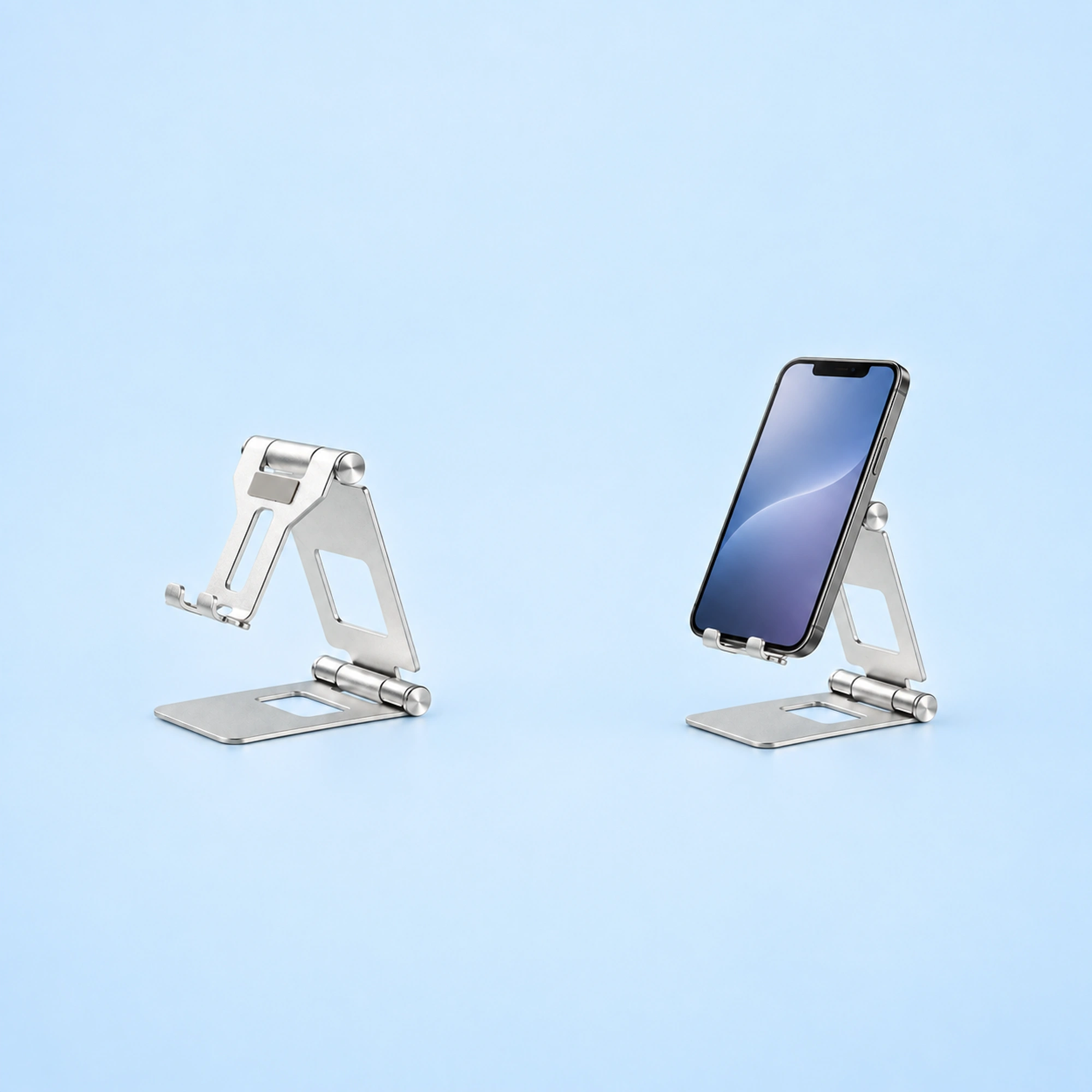 Silver Open-Frame Dual-Hinge Phone Stand shown in use on a light blue background; demonstration device not included