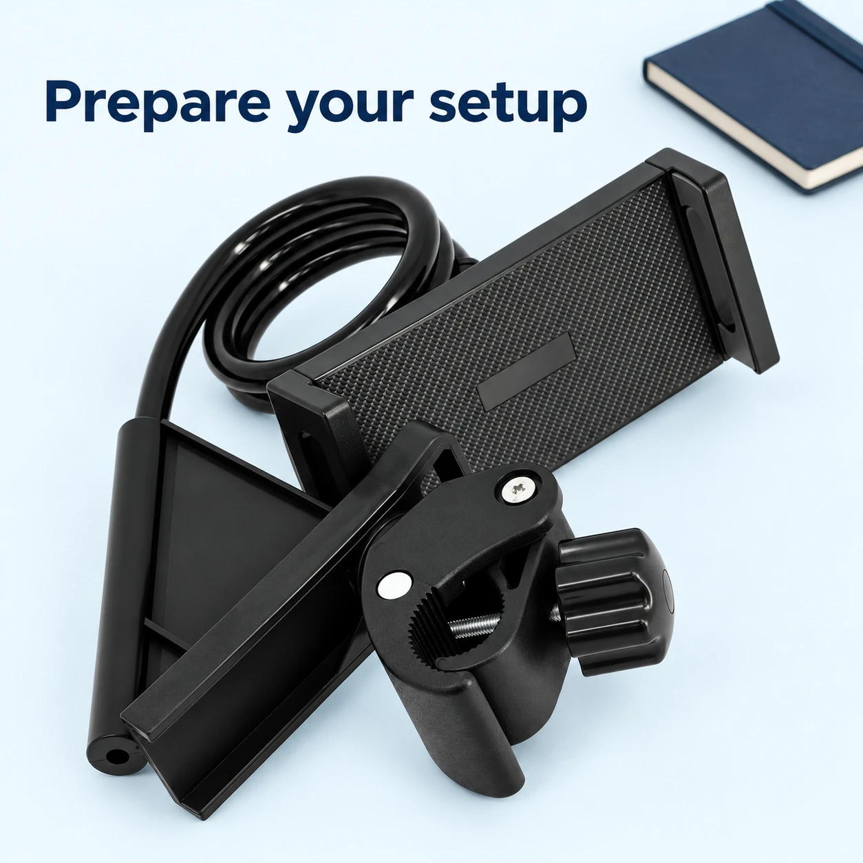 NGT Black Fishing Chair Phone and Tablet Holder — folded holder on preparation table